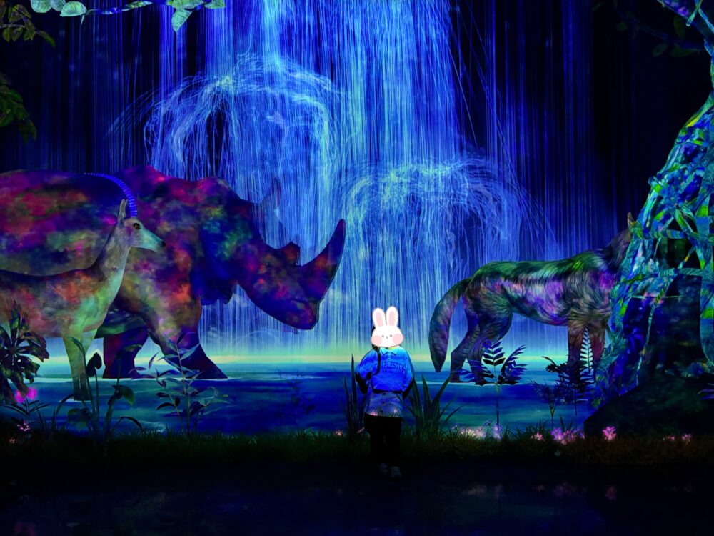 At teamLab Planets Tokyo in Toyosu, children can experience a magical world of water and digital animals like rhinos and wolves. A must-visit immersive art space for families.